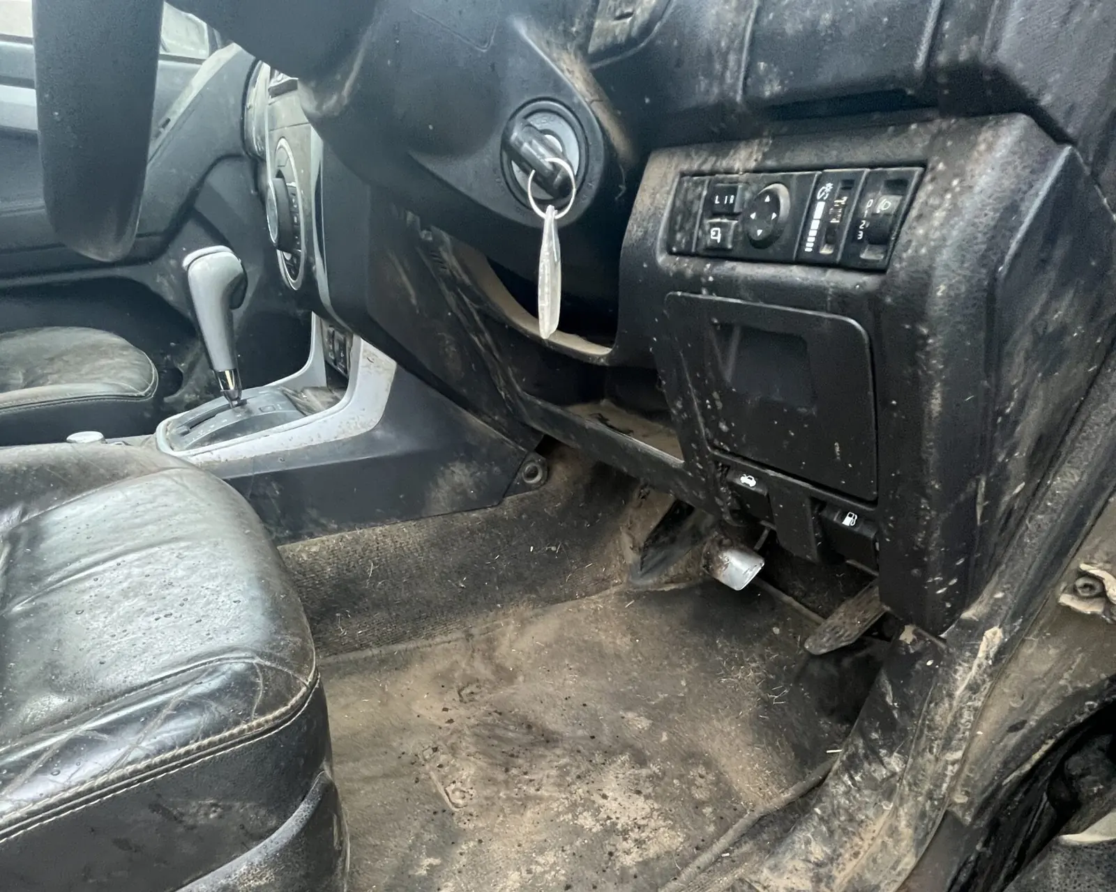 Car interior footwell and console during a deep clean